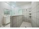 Large walk-in shower with neutral tile and glass enclosure at 6282 Lakepine St, Saint Cloud, FL 34771