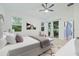Main bedroom with sliding doors to patio, and a neutral decor at 6282 Lakepine St, St Cloud, FL 34771
