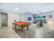 Pool table in open game room with tile floor at 6282 Lakepine St, St Cloud, FL 34771