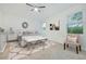 Bright bedroom with a king-size bed and neutral color scheme at 6282 Lakepine St, St Cloud, FL 34771