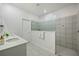 Bathroom boasts double vanity, large shower, and modern finishes at 6282 Lakepine St, St Cloud, FL 34771