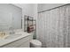 Simple bathroom with shower/tub combo, toilet and vanity at 6282 Lakepine St, St Cloud, FL 34771