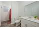 Clean bathroom with a tub shower, toilet and vanity with a large mirror at 6282 Lakepine St, St Cloud, FL 34771