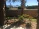 View of a small, private patio area with landscaping at 909 Charo Pkwy # 1011, Davenport, FL 33897