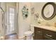 Stylish bathroom with decorative wall art and a modern vanity at 16049 Bristol Lake Cir, Orlando, FL 32828