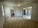 Main bedroom with access to bathroom and patio at 4980 W Castle W St, Kissimmee, FL 34758