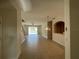 Spacious living room with tile floors and view to backyard at 4980 W Castle W St, Kissimmee, FL 34758
