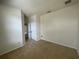 Cozy bedroom with double closets and neutral decor at 4980 W Castle W St, Kissimmee, FL 34758