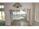 Dining room with sliding glass doors leading to a screened patio at 216 Balmoral Ct, Davenport, FL 33896