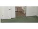 Bedroom with green carpet and an ensuite bathroom at 216 Balmoral Ct, Davenport, FL 33896
