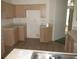 Kitchen with light wood cabinets and tiled flooring at 216 Balmoral Ct, Davenport, FL 33896