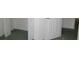Walk-in closet with double doors and carpeted flooring at 216 Balmoral Ct, Davenport, FL 33896