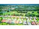 Aerial view showing home location in community near golf course and lake at 316 Treviso Dr, Poinciana, FL 34759
