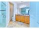Bathroom with vanity and walk-in shower at 316 Treviso Dr, Poinciana, FL 34759