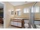 Clean bathroom with vanity, toilet, and shower at 117 Ridge View Dr, Davenport, FL 33837
