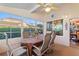 Bright and airy screened porch with seating area and view of the backyard at 117 Ridge View Dr, Davenport, FL 33837