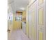 Convenient laundry room with washer, dryer, and extra storage at 117 Ridge View Dr, Davenport, FL 33837