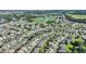 Aerial view showing home location within a large community with golf course at 117 Ridge View Dr, Davenport, FL 33837
