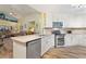 Updated kitchen featuring stainless steel appliances and an island at 117 Ridge View Dr, Davenport, FL 33837