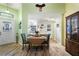 Cozy dining area with a small table and chairs, located near the kitchen at 117 Ridge View Dr, Davenport, FL 33837