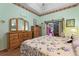Main bedroom with dresser, large closet, and view of the backyard at 117 Ridge View Dr, Davenport, FL 33837