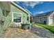 Inviting patio with fire pit and seating area, perfect for outdoor entertaining at 117 Ridge View Dr, Davenport, FL 33837