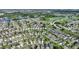 Aerial view showing home's location within a community near a golf course at 117 Ridge View Dr, Davenport, FL 33837