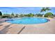 Relaxing pool area with plenty of lounge chairs at 117 Ridge View Dr, Davenport, FL 33837