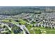 Aerial view highlighting home location in a community near a golf course at 117 Ridge View Dr, Davenport, FL 33837