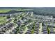 Home location shown in an aerial view of a large community near a golf course at 117 Ridge View Dr, Davenport, FL 33837