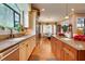 Large kitchen with island, stainless steel appliances, and hardwood floors at 19529 Dorr Rd, Altoona, FL 32702