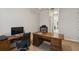 Home office with built-in desk and plenty of storage at 203 Escondido Ct, Poinciana, FL 34759