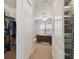 Spacious walk-in closet with ample shelving and drawers at 203 Escondido Ct, Poinciana, FL 34759