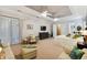 Spacious main bedroom with sitting area and TV at 203 Escondido Ct, Poinciana, FL 34759