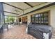 Relaxing hot tub located on a spacious covered patio at 203 Escondido Ct, Poinciana, FL 34759