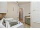 Bright laundry room with washer, dryer and extra storage at 203 Escondido Ct, Poinciana, FL 34759
