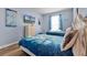Bedroom with twin beds, Frozen bedding, and dresser at 7671 Comrow St # 202, Kissimmee, FL 34747