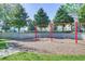 playground with swings set on wood chips at 7671 Comrow St # 202, Kissimmee, FL 34747