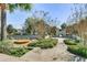 Community playground with a carousel and castle-themed play area at 7671 Comrow St # 202, Kissimmee, FL 34747