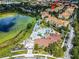 Community overview featuring pool, landscaping, and building location at 7671 Comrow St # 202, Kissimmee, FL 34747