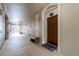 Condo hallway with private entry and bench at 7671 Comrow St # 202, Kissimmee, FL 34747