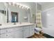 Bathroom with vanity, tub, and shower at 7671 Comrow St # 202, Kissimmee, FL 34747