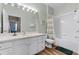 Bathroom with vanity, tub, and shower at 7671 Comrow St # 202, Kissimmee, FL 34747