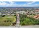 Aerial view of community entrance and surrounding landscape at 7671 Comrow St # 202, Kissimmee, FL 34747