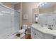 Clean bathroom with shower/tub combo, vanity, and updated fixtures at 7671 Comrow St # 202, Kissimmee, FL 34747