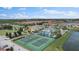 Community overview: Pool, tennis and basketball courts, and residential buildings at 2941 Banana Palm Dr # 2941, Kissimmee, FL 34747