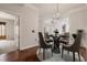 Elegant dining room with hardwood floors and chandelier at 501 Mirasol Cir # 424, Celebration, FL 34747