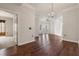 Open dining room with hardwood floors and chandelier at 501 Mirasol Cir # 424, Celebration, FL 34747