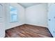Bright bedroom with wood-look floors and double door closet at 10091 Austrina Oak Loop, Winter Garden, FL 34787