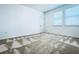 Well-lit bedroom featuring neutral carpet and door at 10091 Austrina Oak Loop, Winter Garden, FL 34787